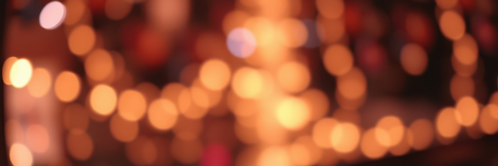 Warm lights create a cozy atmosphere in a festive setting during the evening at a popular gathering spot